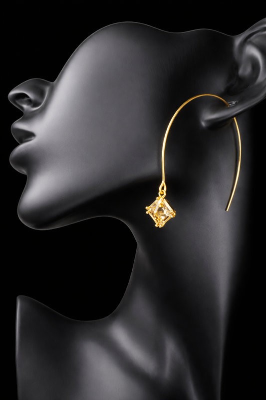 Crafted from sterling silver with a gold-wash finish, these uniquely designed earrings will be great for when you're looking for something a little different.