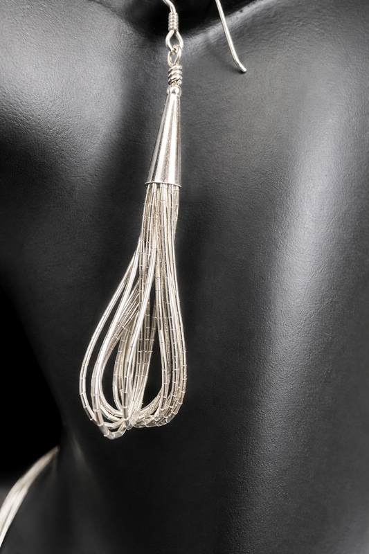 Crafted from sterling silver, this vintage necklace and earrings set seamlessly bridges classic elegance and contemporary style. Whether you're embracing full vintage aesthetics or seeking a distinctive accent for modern pieces, this set delivers timeless appeal with everyday versatility.