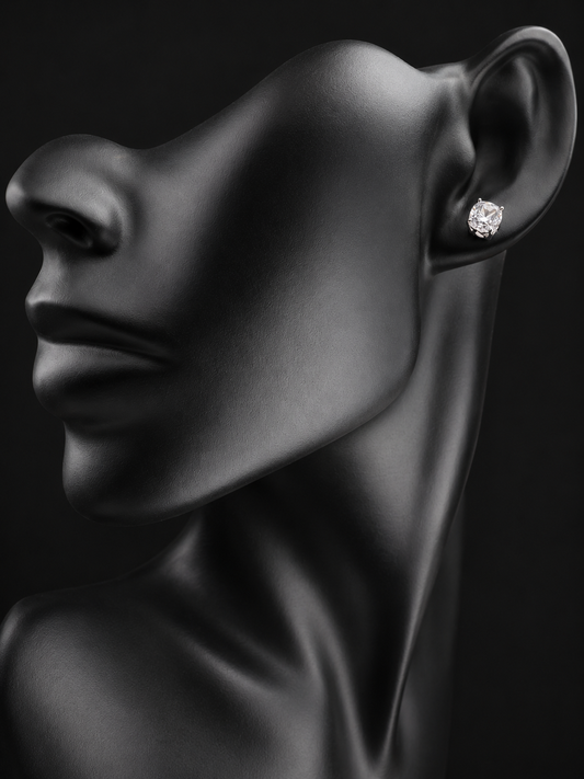 These sterling silver and CZ earrings combine timeless elegance with modern sparkle. Each piece features a generous 6 mm cubic zirconia stone set in premium sterling silver, delivering brilliant shine at a fraction of the cost of diamonds. Perfect for everyday wear or special occasions, these earrings offer versatile style that complements any wardrobe.