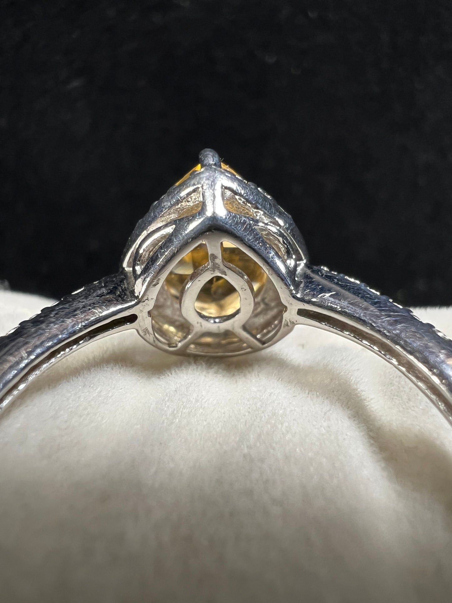 This exquisite ring features a pear-shaped citrine set in polished sterling silver, combining timeless elegance with vibrant color.