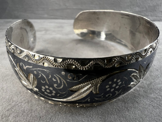 This is a beautifully crafted bracelet that has withstood the test of time. Markings on this piece indicate it was made in Russia.