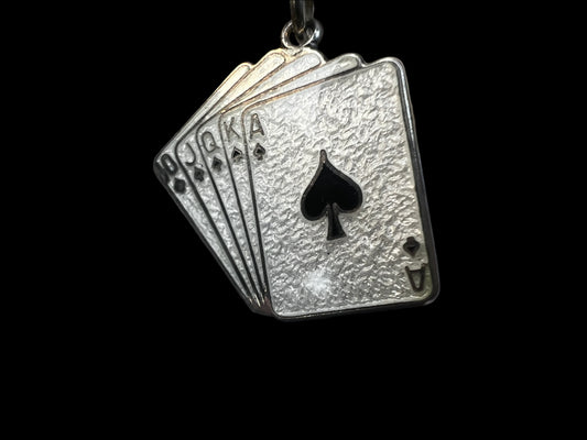 This sterling silver charm is for the card-game lover or anyone who appreciates good fortune. Who wouldn't want to be holding this hand?