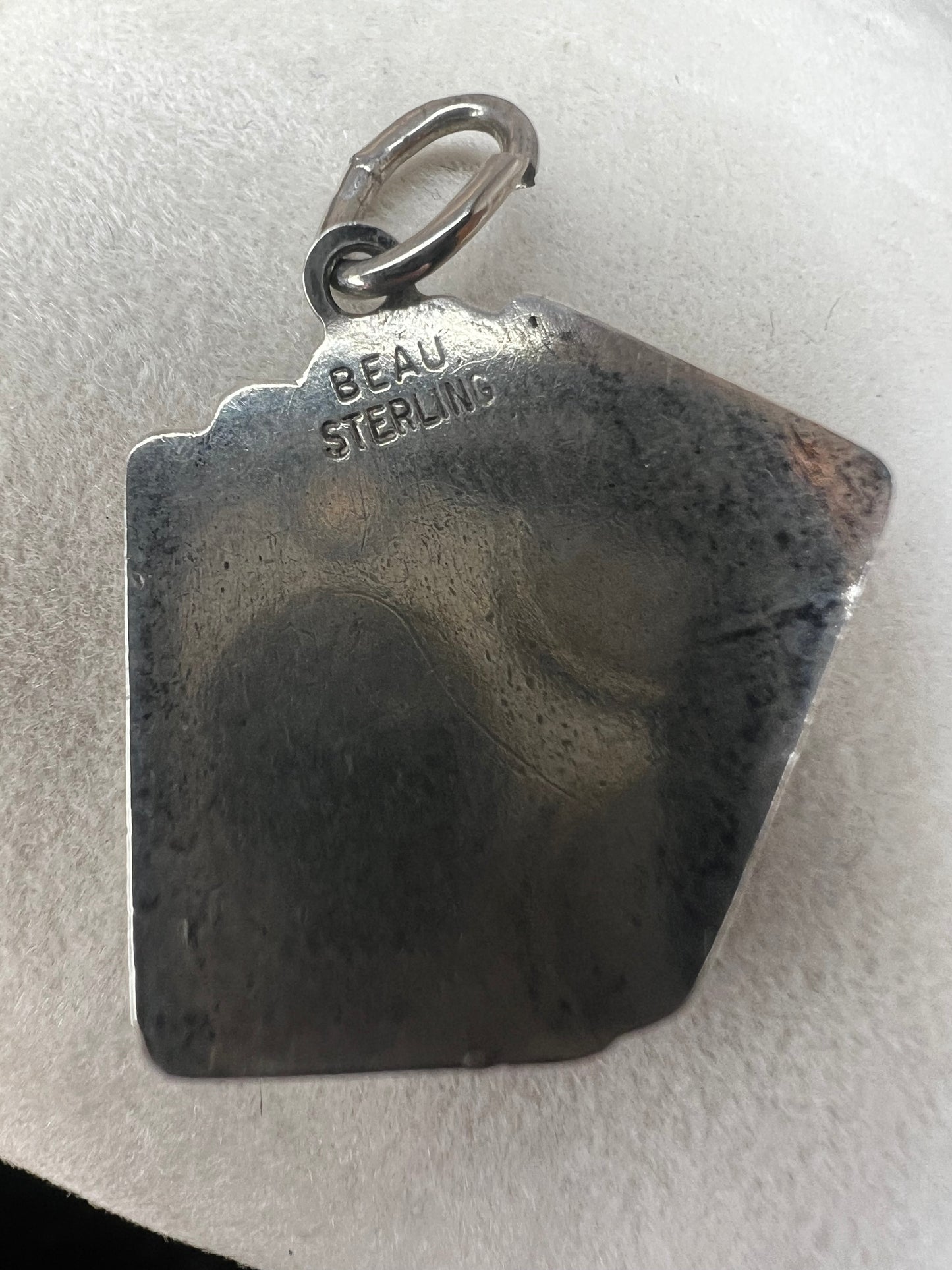 This sterling silver charm is for the card-game lover or anyone who appreciates good fortune. Who wouldn't want to be holding this hand?