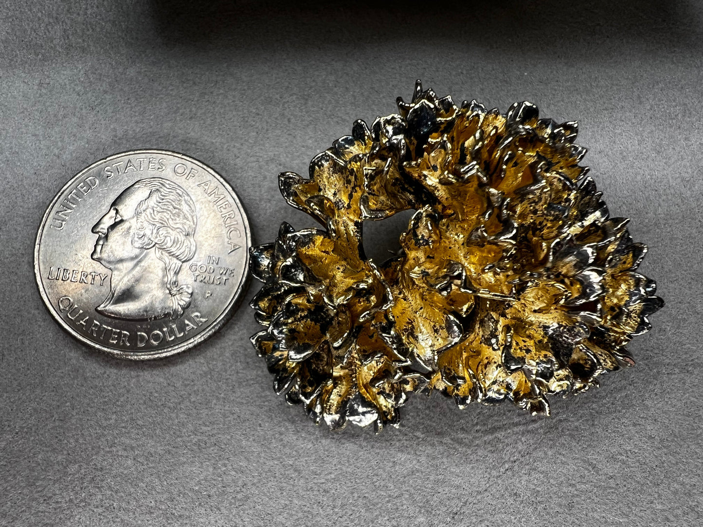 This is an elegant mid-century Flora Danica parsley brooch handcrafted in sterling silver with a warm gold-wash finish. It's a timeless accessory perfect for collectors of vintage Scandinavian jewelry or anyone who appreciates fine craftsmanship and nature-inspired design. Signed Eggert Denmark.