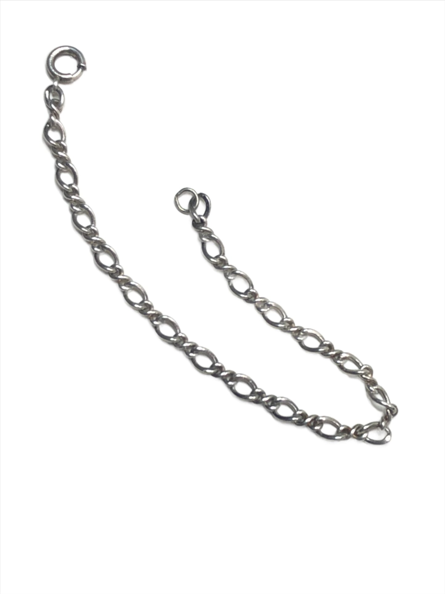 Show off your style with this sophisticated sterling silver bracelet, which features a figure-eight chain design. This timeless piece is perfect on its own, or you can personalize it with your favorite charms.