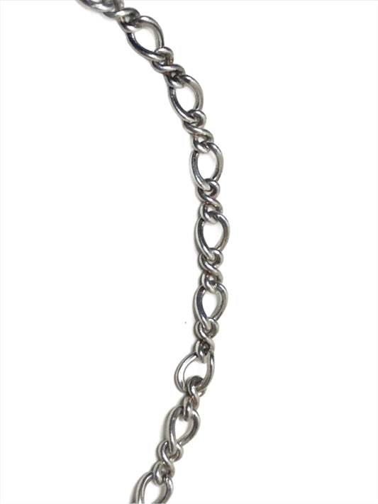 Show off your style with this sophisticated sterling silver bracelet, which features a figure-eight chain design. This timeless piece is perfect on its own, or you can personalize it with your favorite charms.