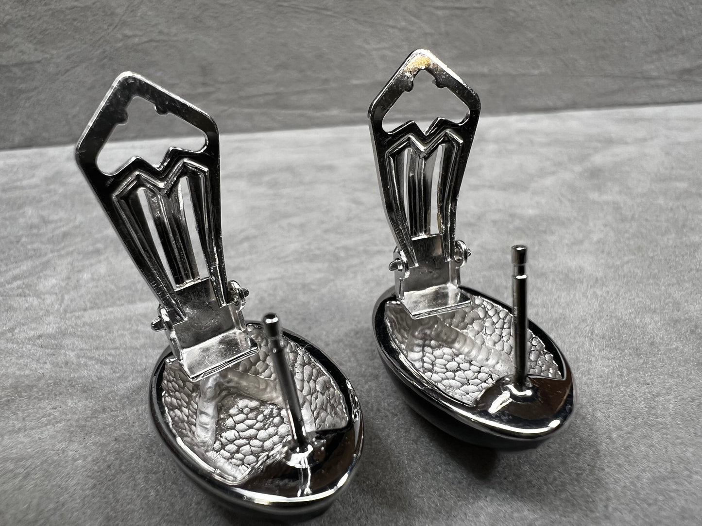 Add a vibrant touch to your collection with these vintage Italian earrings. Crafted from sterling silver, they feature striking orange and black inlay.