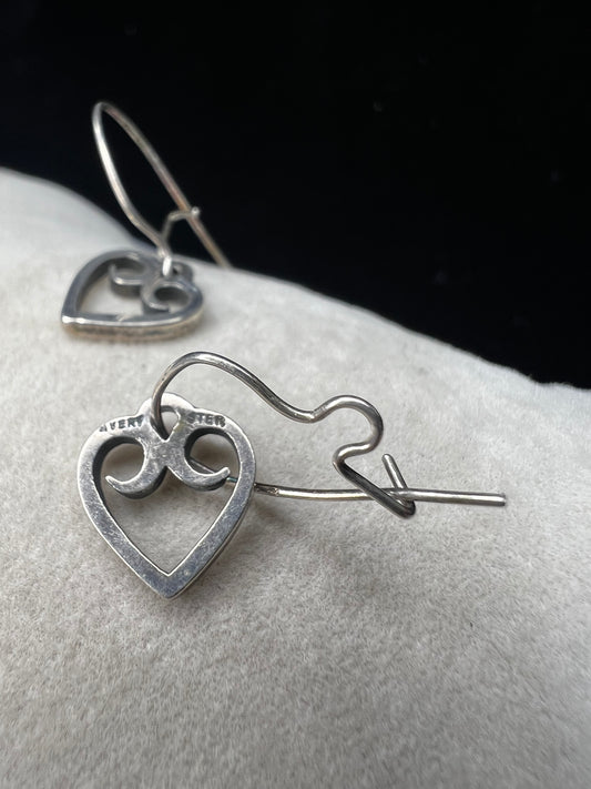 These sterling silver heart earrings are expertly crafted from solid sterling silver. With the trusted Avery name, they offer reliable quality and a classic design that adds a delicate, elegant touch to any outfit.