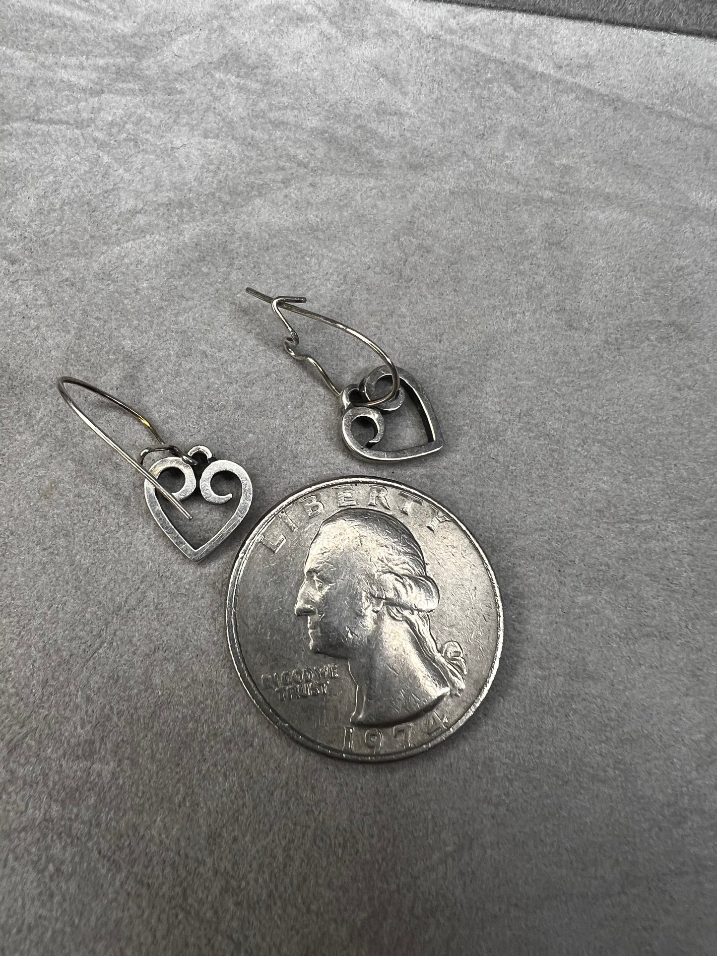 These sterling silver heart earrings are expertly crafted from solid sterling silver. With the trusted Avery name, they offer reliable quality and a classic design that adds a delicate, elegant touch to any outfit.