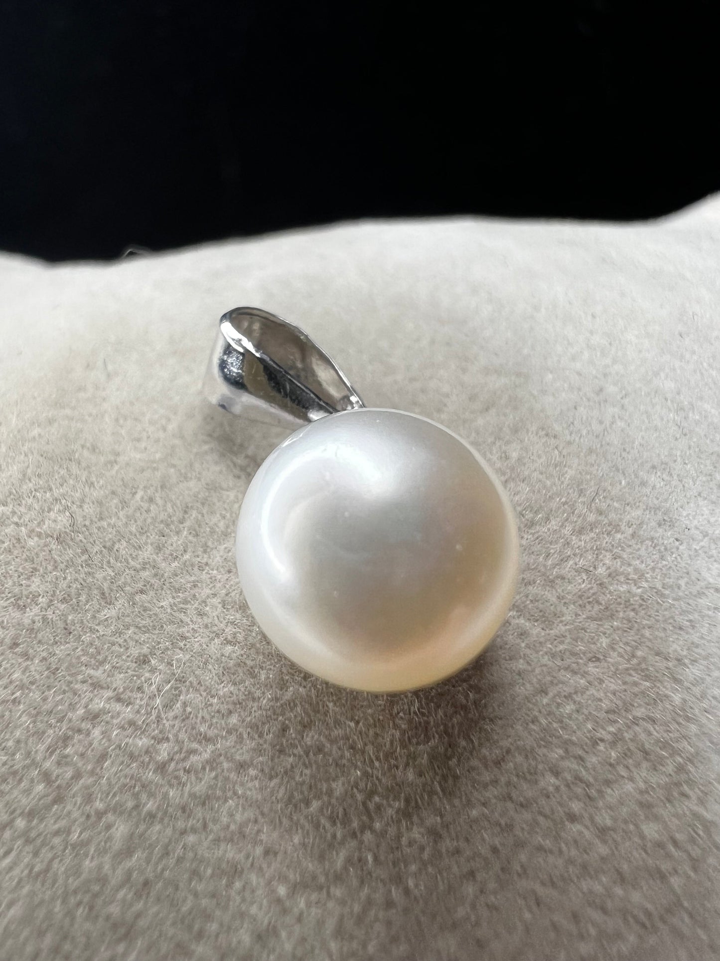 This sterling silver and pearl pendant is perfect for just a touch of elegance. It's ready to pair with one of our silver chains.