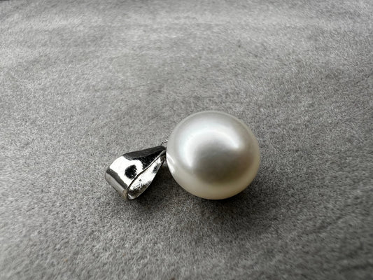 This sterling silver and pearl pendant is perfect for just a touch of elegance. It's ready to pair with one of our silver chains.