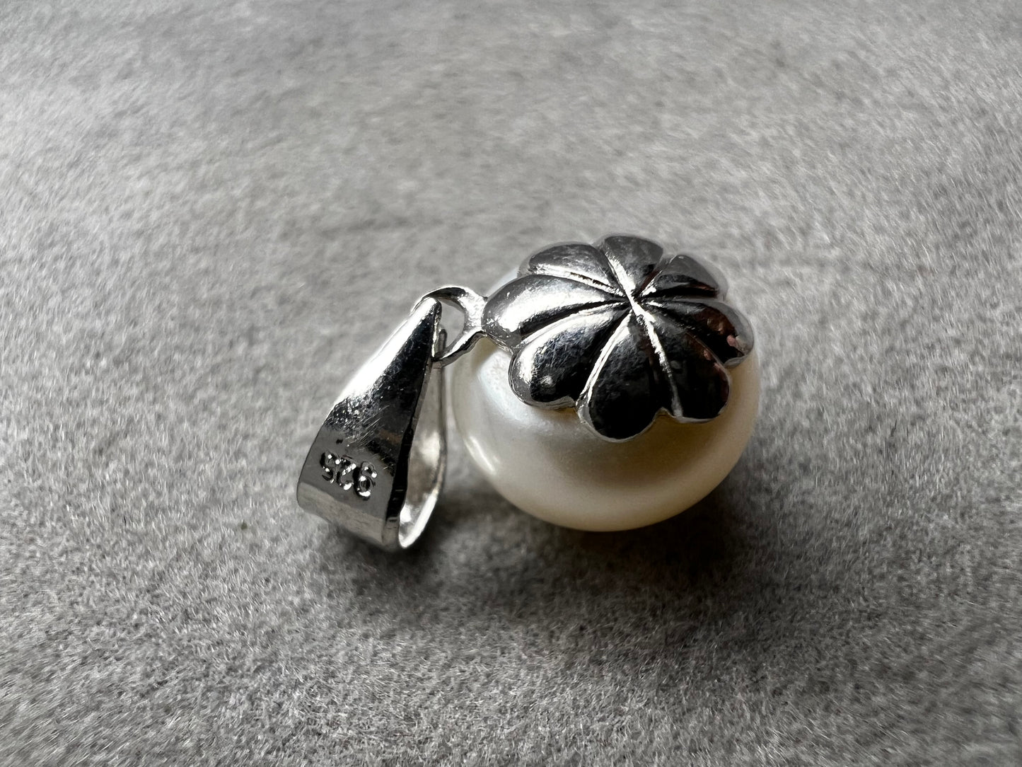 This sterling silver and pearl pendant is perfect for just a touch of elegance. It's ready to pair with one of our silver chains.