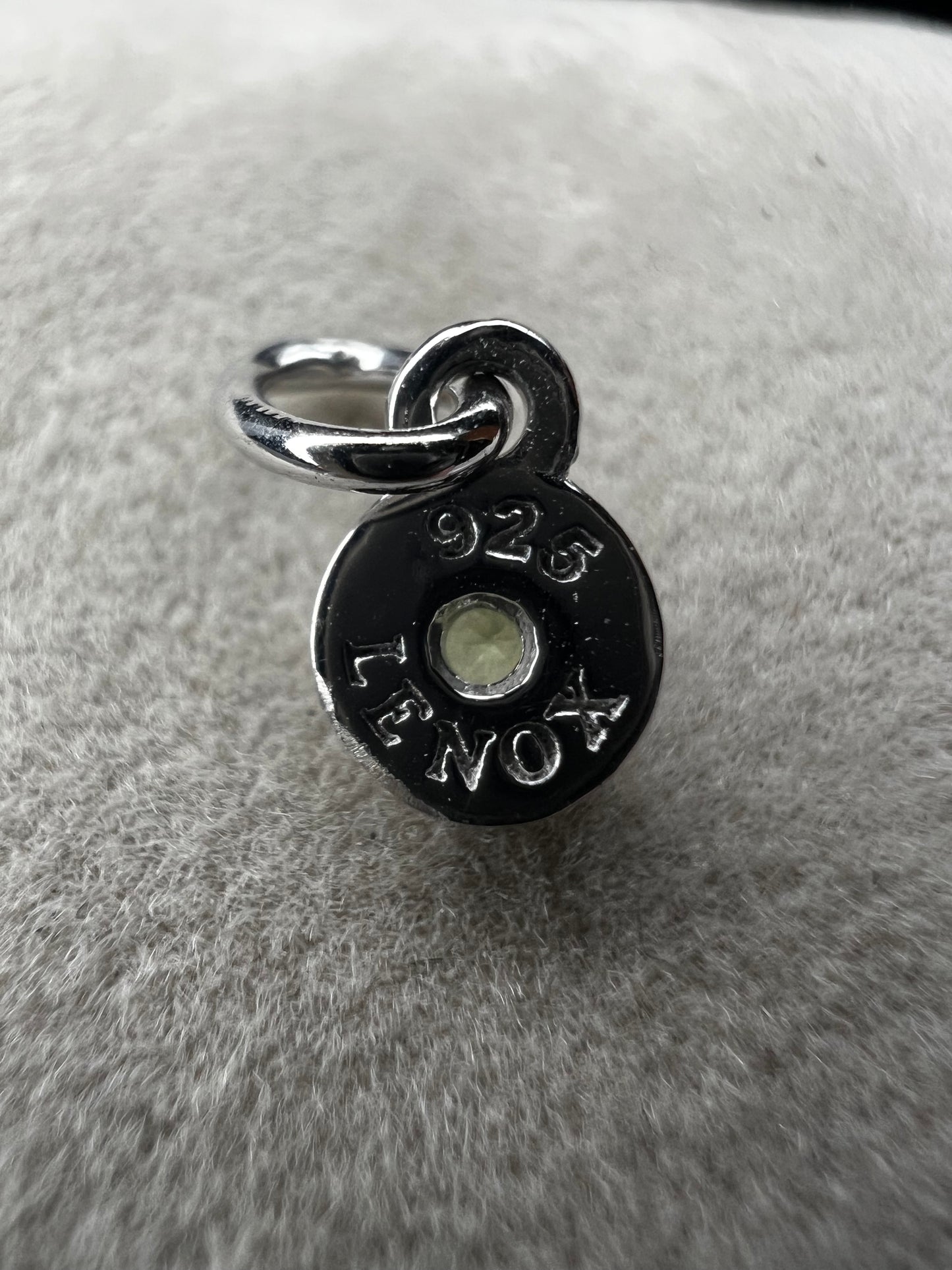 From Lenox, this little pendant is ready to be paired with a small chain or used as a charm.