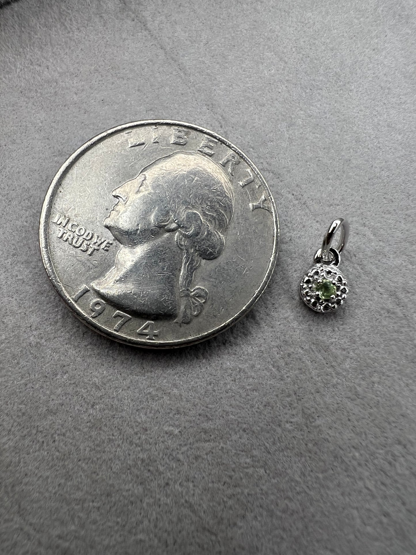 From Lenox, this little pendant is ready to be paired with a small chain or used as a charm.