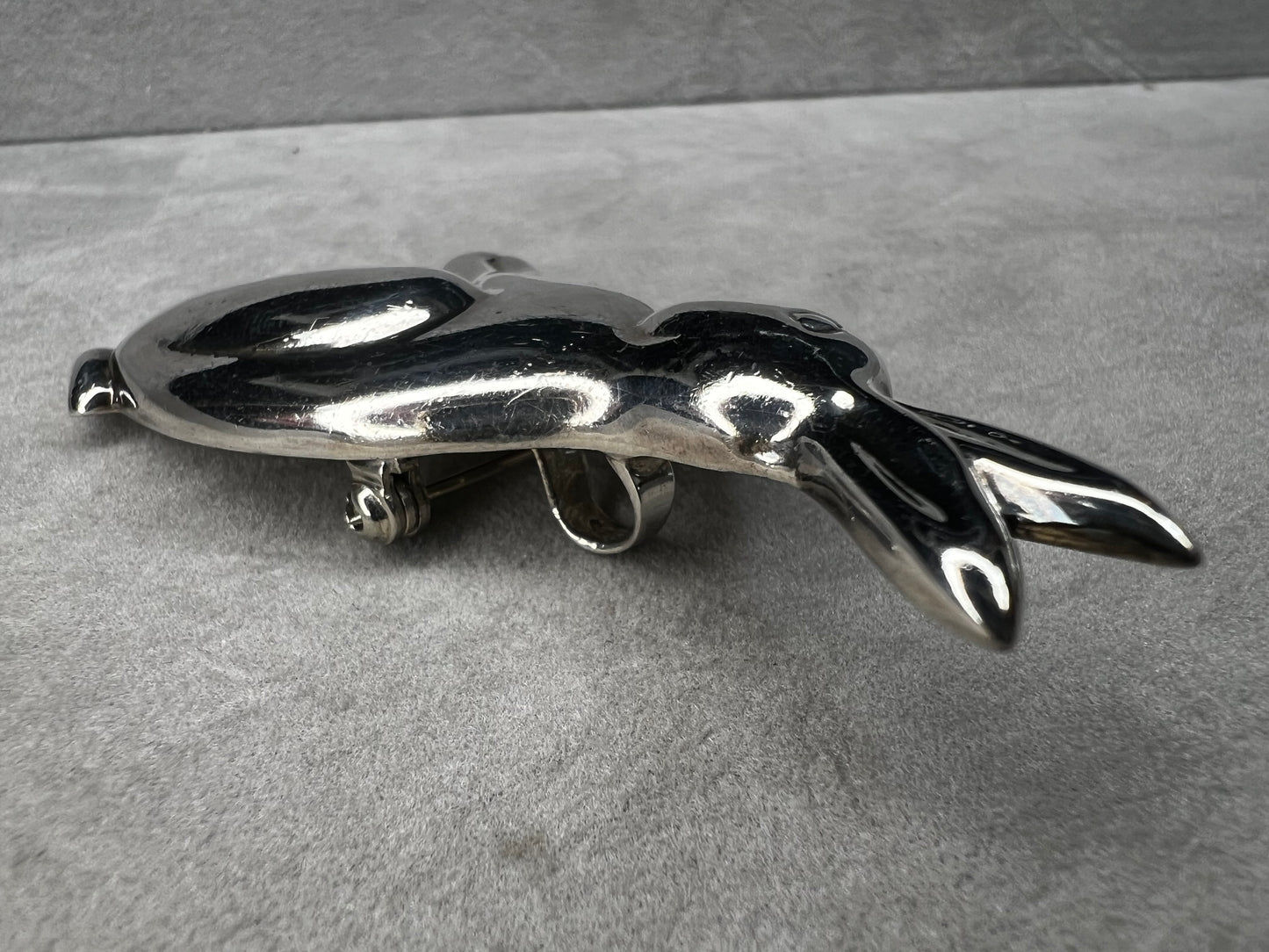 This sterling silver rabbit offers versatile wear as either a pendant or a brooch. Its charming design makes it a delightful addition to any collection, perfect for adding a touch of whimsy and elegance to your style.