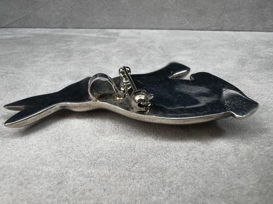 This sterling silver rabbit offers versatile wear as either a pendant or a brooch. Its charming design makes it a delightful addition to any collection, perfect for adding a touch of whimsy and elegance to your style.