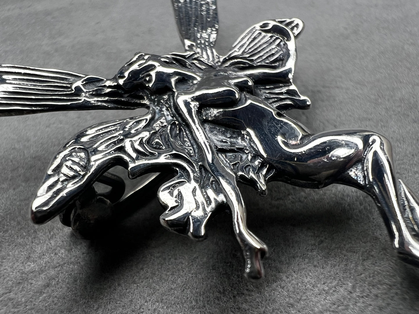Crafted from sterling silver, this 2" nude goddess fairy brooch from the 1980s adds a unique touch to the right outfit or special occasion.