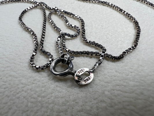 This vintage 19" Italian sterling silver box chain offers timeless elegance that you can wear alone or layer effortlessly with other necklaces. Its sturdy design makes it the perfect match for showcasing your favorite pendant, adding a touch of classic style to any look.