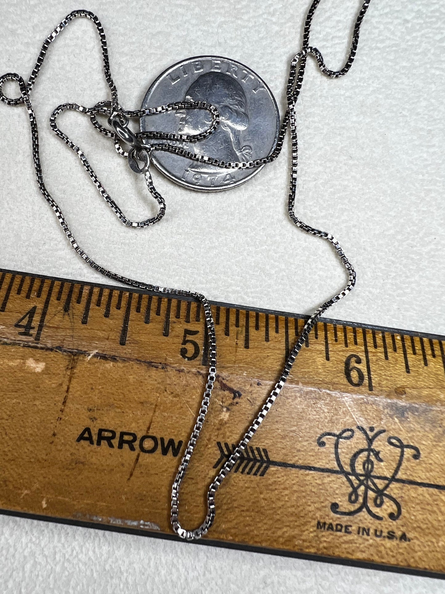 This vintage 19" Italian sterling silver box chain offers timeless elegance that you can wear alone or layer effortlessly with other necklaces. Its sturdy design makes it the perfect match for showcasing your favorite pendant, adding a touch of classic style to any look.