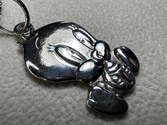 This vintage 16" sterling silver Baby Tweety Bird pendant necklace blends nostalgic charm with timeless style. Paired perfectly with a vintage Italian chain, the pendant creates a delightful Looney Tunes-inspired look that’s both playful and elegant. Ideal for adding a unique, vintage touch to your everyday wardrobe.