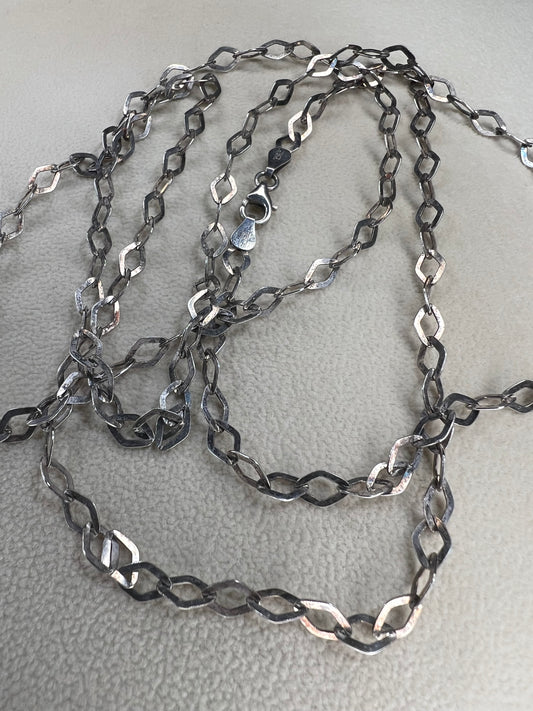 Elevate your jewelry collection with this vintage Italian OTC sterling silver necklace, measuring a striking 42 inches — the perfect length to create layered looks or wear as a standout statement piece.