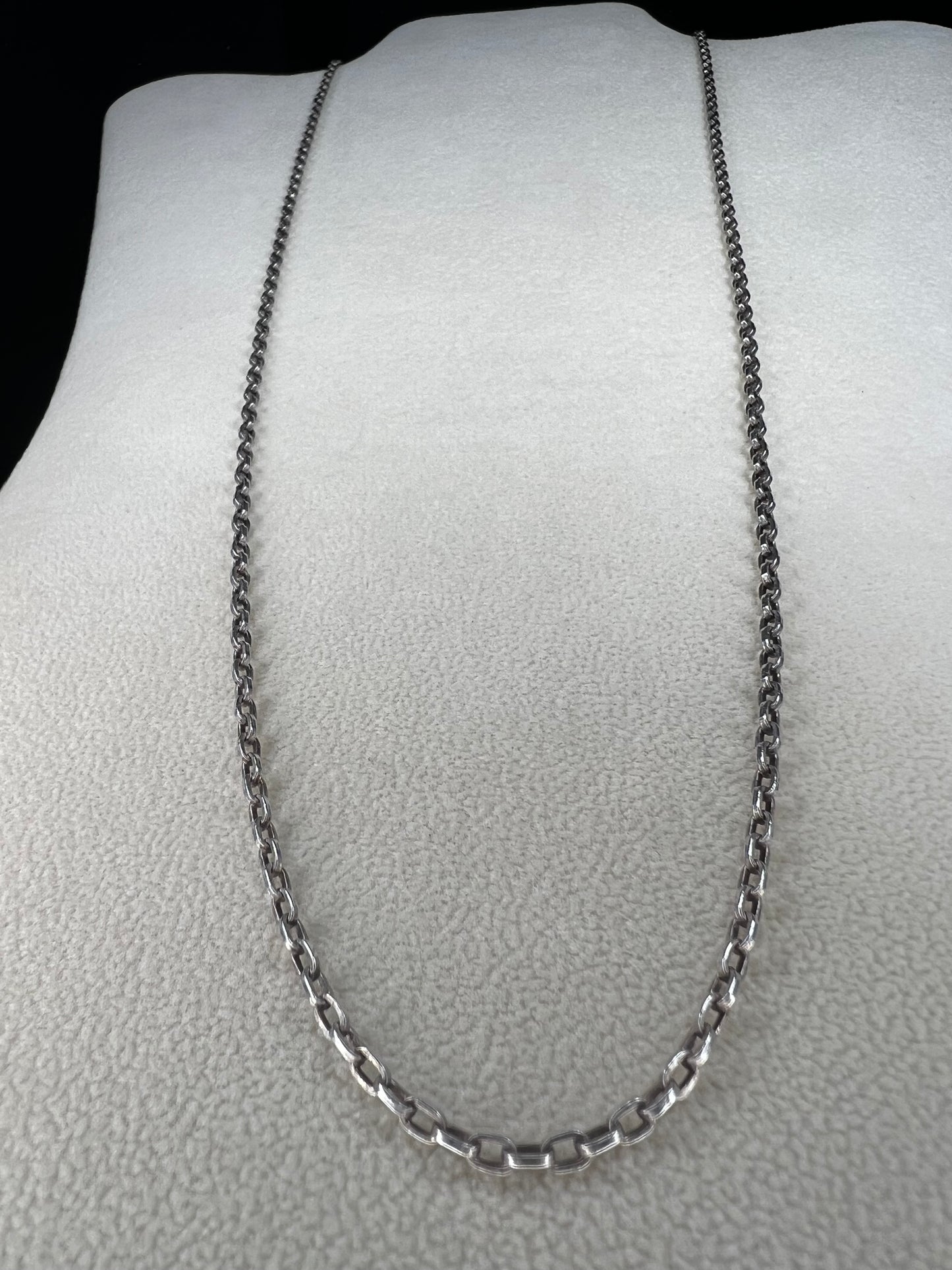 This vintage 26" sterling silver cable chain offers a strong, durable design that stands out beautifully on its own or complements any pendant with ease. Its classic style and reliable construction would make it a versatile addition to your jewelry collection.