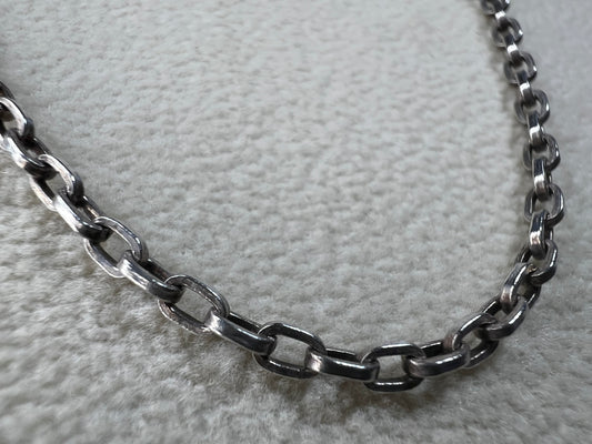 This vintage 26" sterling silver cable chain offers a strong, durable design that stands out beautifully on its own or complements any pendant with ease. Its classic style and reliable construction would make it a versatile addition to your jewelry collection.