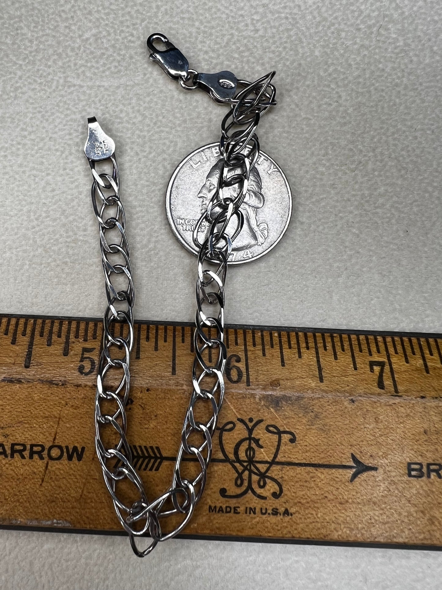This sterling silver bracelet showcases a timeless design that stands out on its own or can be personalized as a charm bracelet.