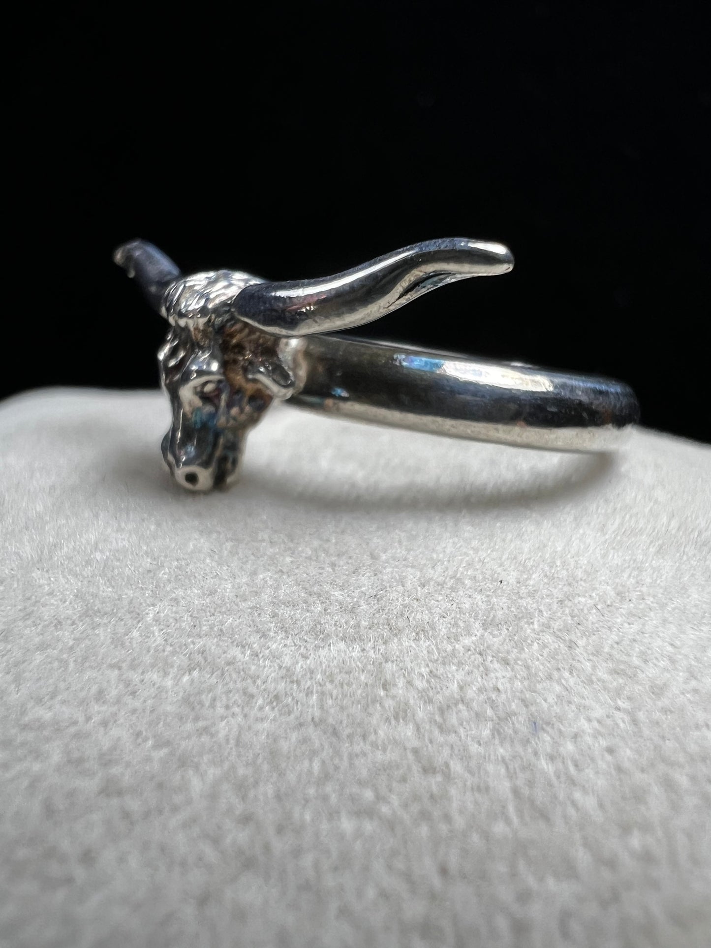 Add a little wild spirit to your style with this sterling silver ring featuring a charming longhorn bull head. Playful yet perfectly detailed, it’s the perfect way to show off your bold side with a touch of fun flair.