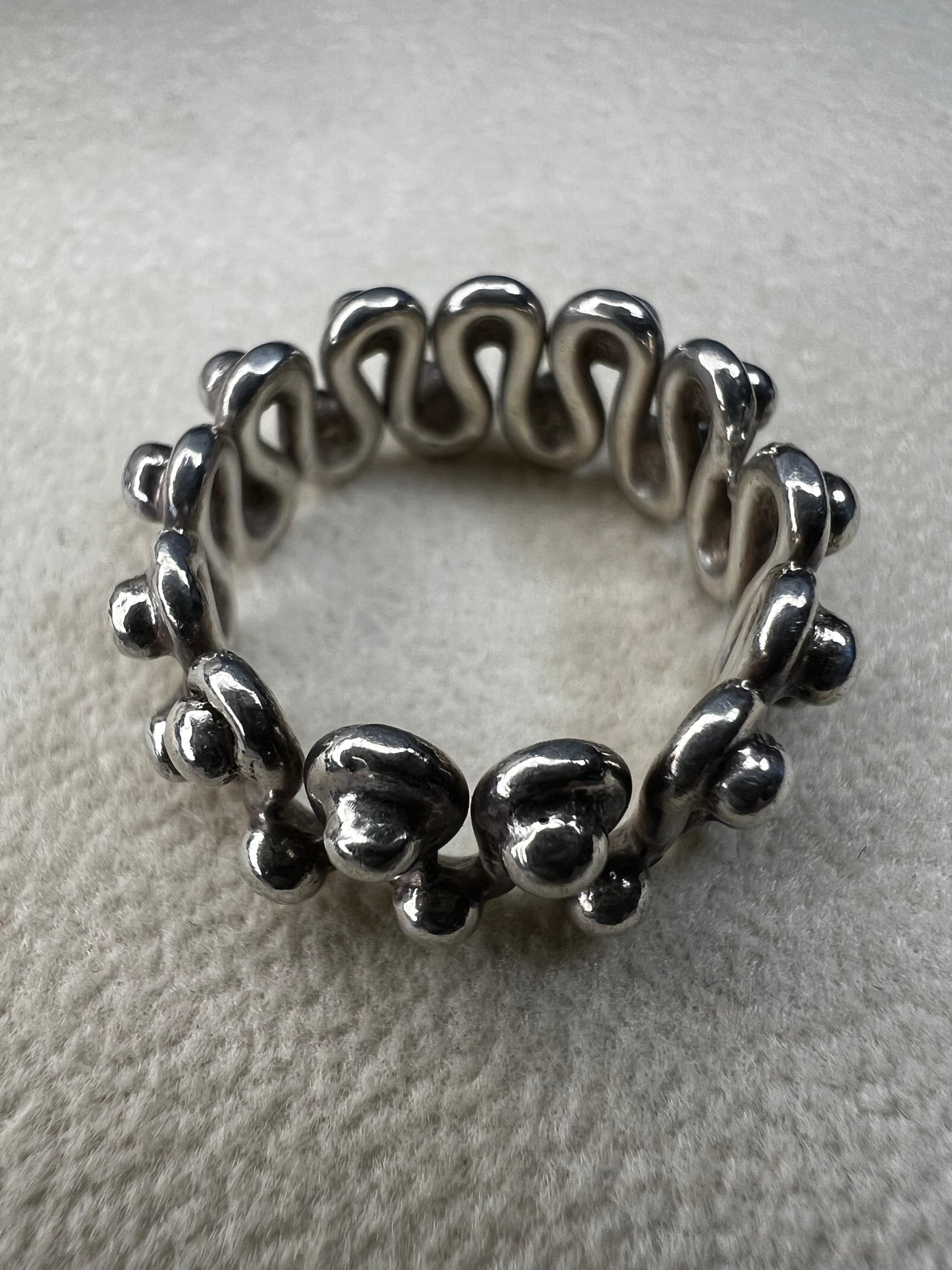 Add a dash of timeless charm to your style with this vintage sterling silver ring. Its unique design captures a playful spirit and will bring a one-of-a-kind flair to any outfit.