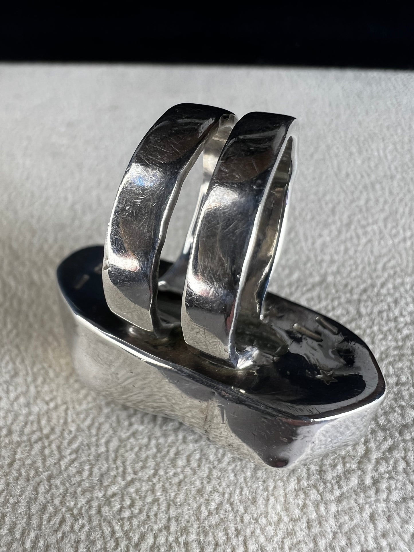 This Loving Anvil ring combines fine sterling silver with a stunning large Herkimer diamond, carefully designed to shine with natural brilliance. The double band adds extra strength, ensuring the ring remains comfortable and secure.