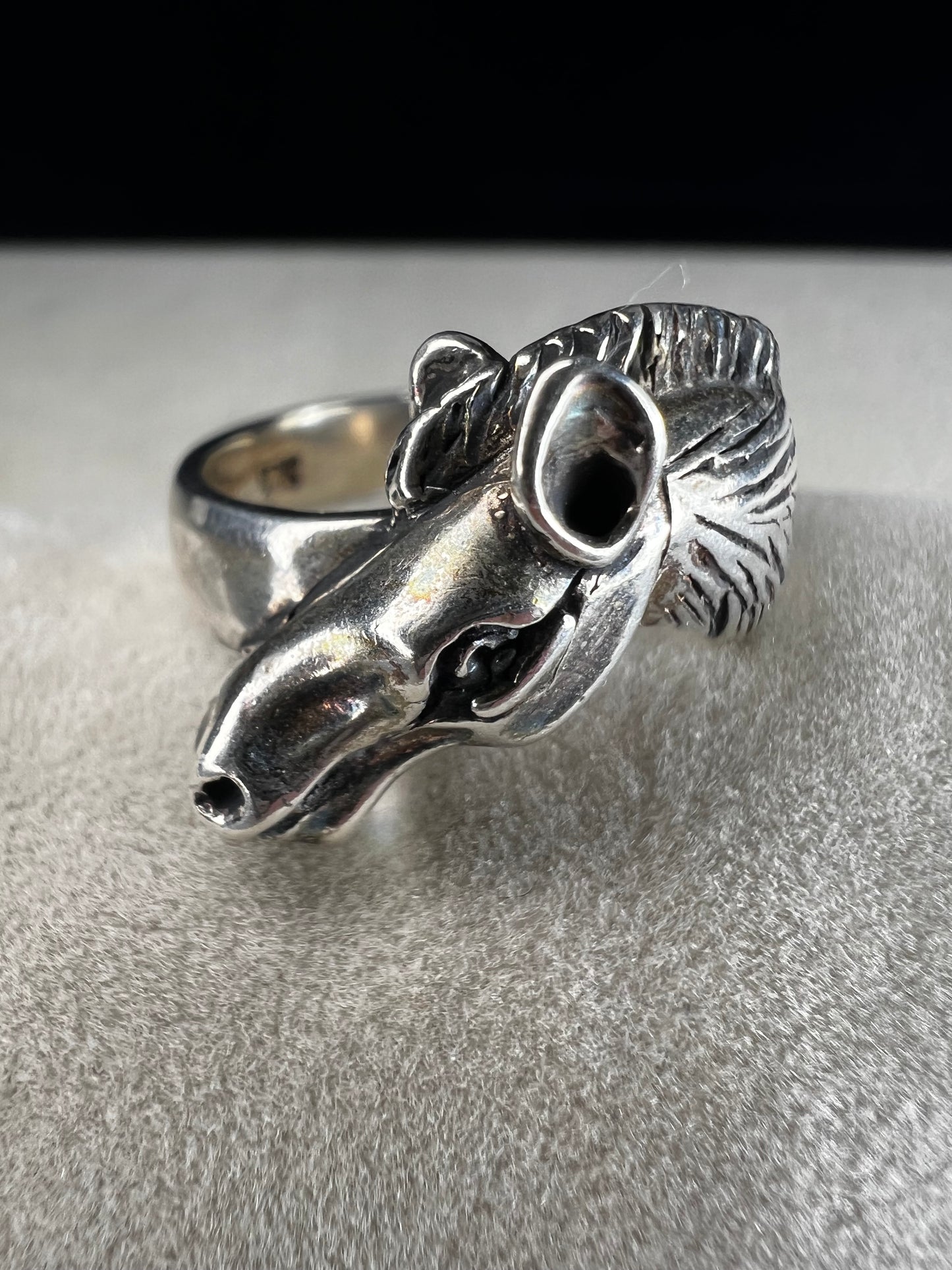 Expertly crafted from sterling silver, this ring showcases a meticulously detailed horse head, capturing the essence of equine beauty with precision. Perfect for anyone who has a love for horses.