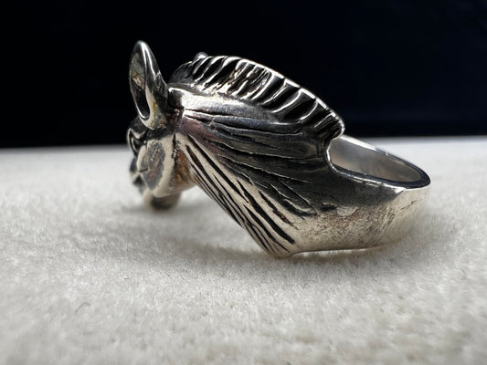 Expertly crafted from sterling silver, this ring showcases a meticulously detailed horse head, capturing the essence of equine beauty with precision. Perfect for anyone who has a love for horses.