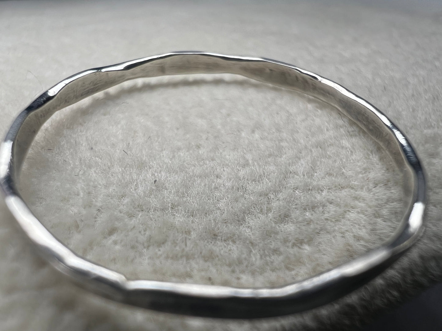 This simple vintage sterling silver band brings a subtle touch of class to any outfit. Its timeless design is perfect for those who appreciate understated elegance and want a piece that complements every style.
