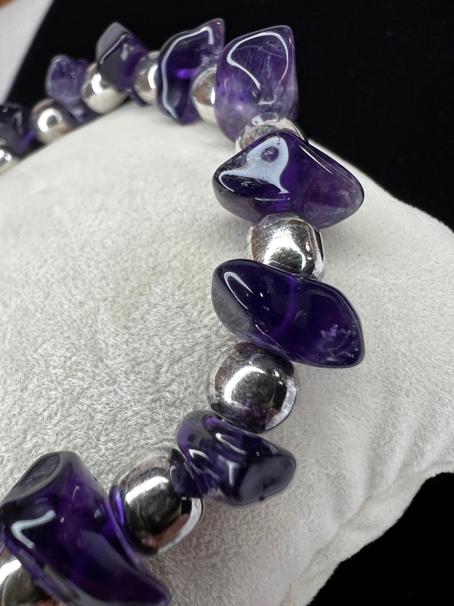 Upgrade your outfit with this elegant bracelet. It features natural amethyst and sterling silver beads secured by a convenient toggle closure.