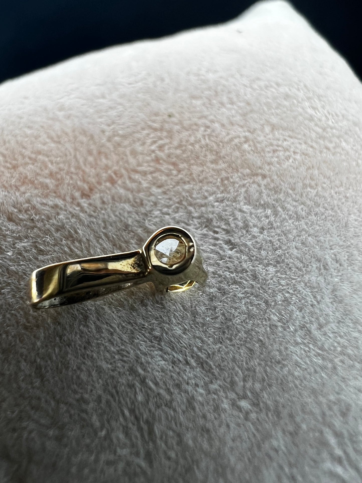 Add a touch of elegance with our 14 karat gold pendant featuring a small citrine. The petite size makes it perfect for everyday wear, adding a subtle pop of color to any outfit.