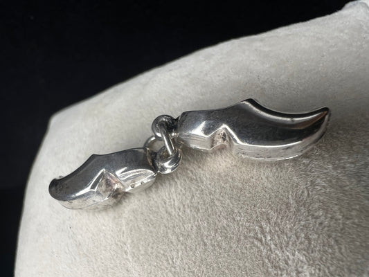 These miniature Dutch shoes are made with .835 silver and have a mid-century Dutch hallmark.