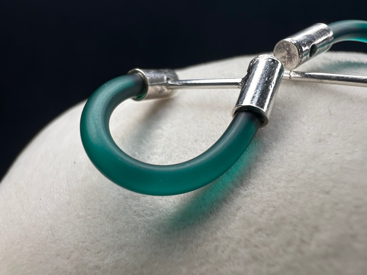 Complement your outfit with these unique earrings. They will add a nice pop of color.