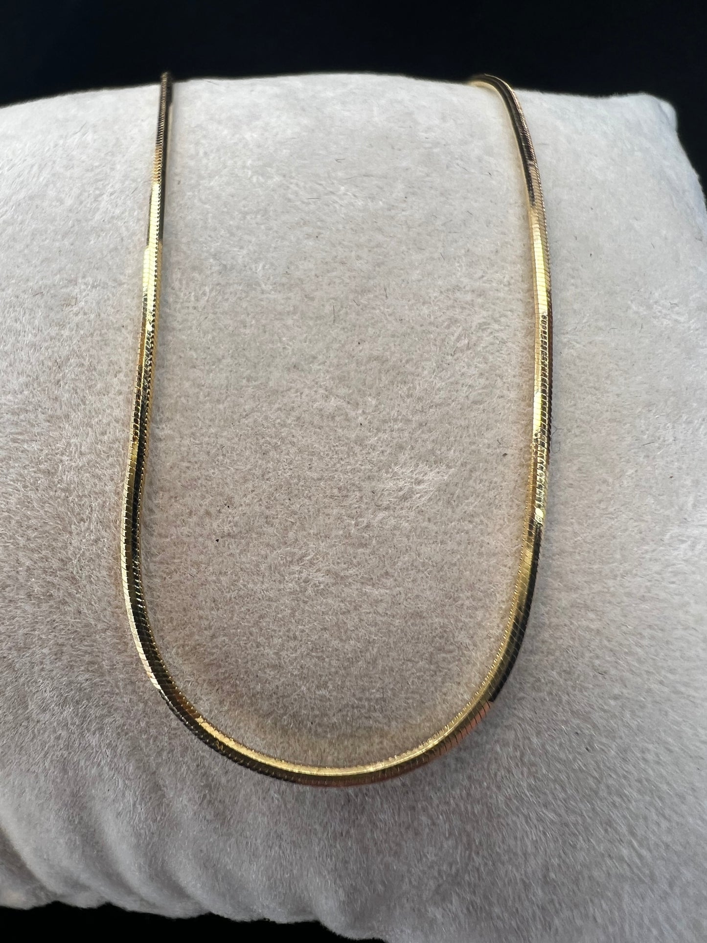 Crafted from 14 karat gold, this box herringbone makes for a stronger link to give you a lasting piece of jewelry.