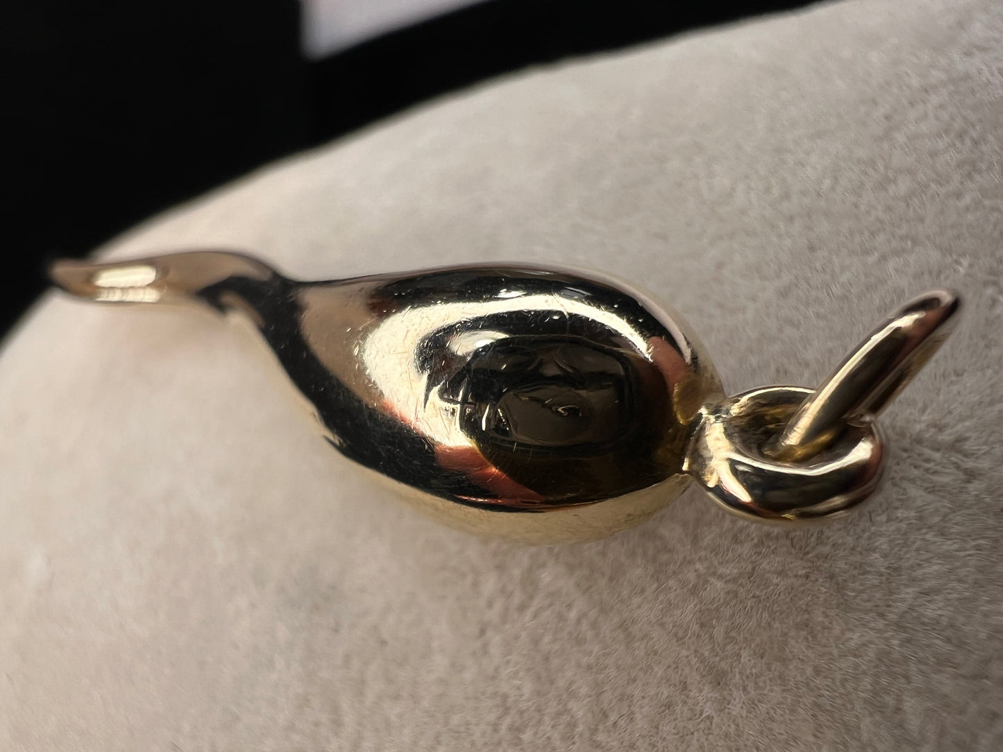 This pendant features "The Italian "Horn", which is intended to protect against evil and bad luck. Crafted from 14 karat gold, this piece is a perfect addition to your jewelry collection.