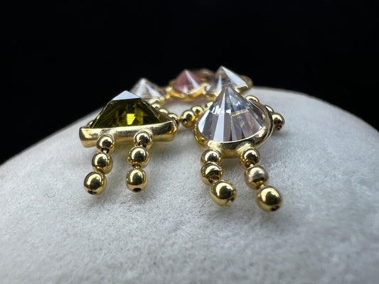 Crafted with 14 karat gold and set with crystals, this beautiful piece is perfect for anyone with a son and daughter or other special pair in their life.