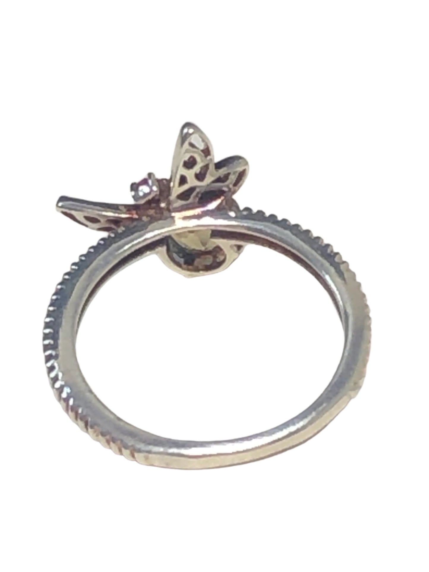 This sterling silver ring is the perfect standout accessory. It features a colorful flying insect, whose body is a citrine and its head, a ruby.