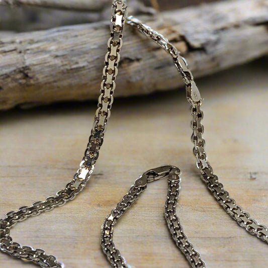 Elevate your look with this sterling silver necklace and bracelet set. Each piece will add elegance to your outfit, whether worn together or separately. Made in Italy.