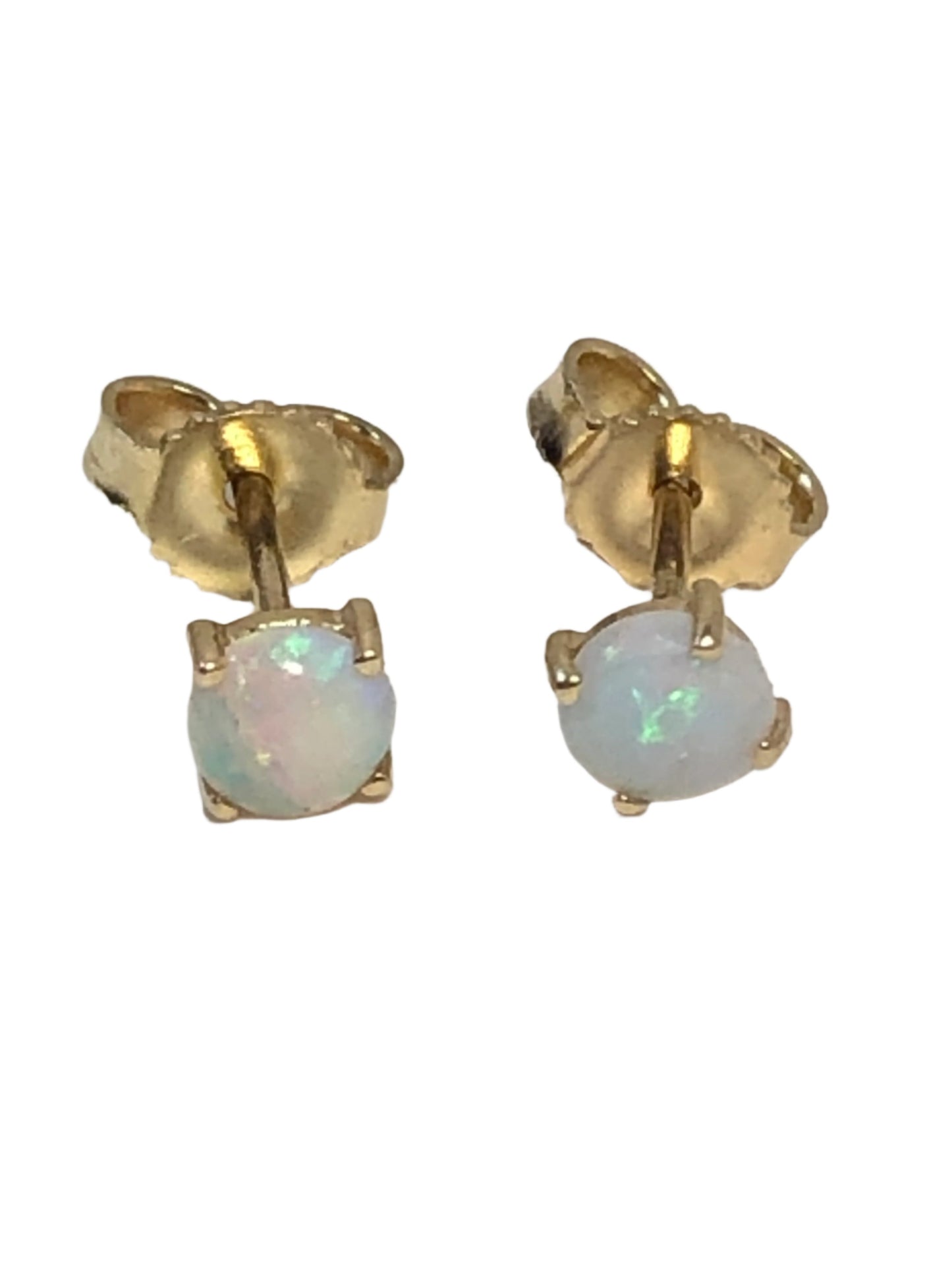 These 14 karat gold stud earrings are adorned with shimmering opals. They are suited for casual wear or a dressier outfit.