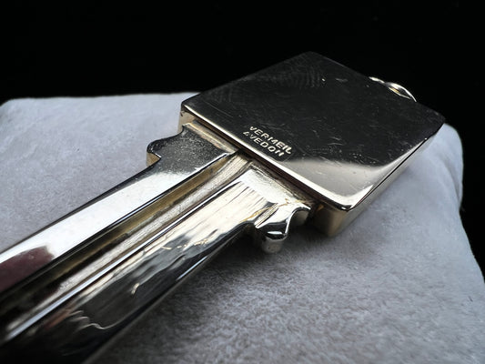 Here is a unique pendant for the car enthusiast. Made from sterling silver with a gold overlay, this is a good looking pendant.