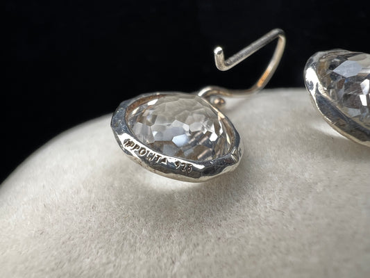 Discover the elegant sophistication of these Ippolita earrings. Handcrafted from high-quality sterling silver and adorned with sparkling spinel, these Italian-designed earrings will add a touch of luxury to any outfit.