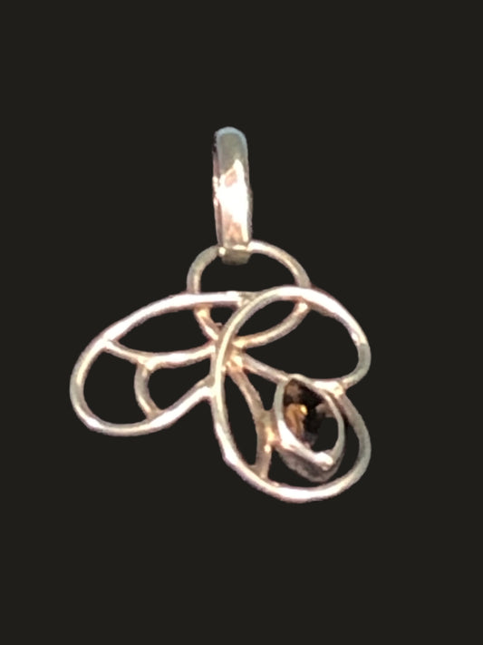 Embrace your individuality with this beautiful sterling silver pendant. With an artistic flowing design, this piece features a spinel stone with rich brown hues.