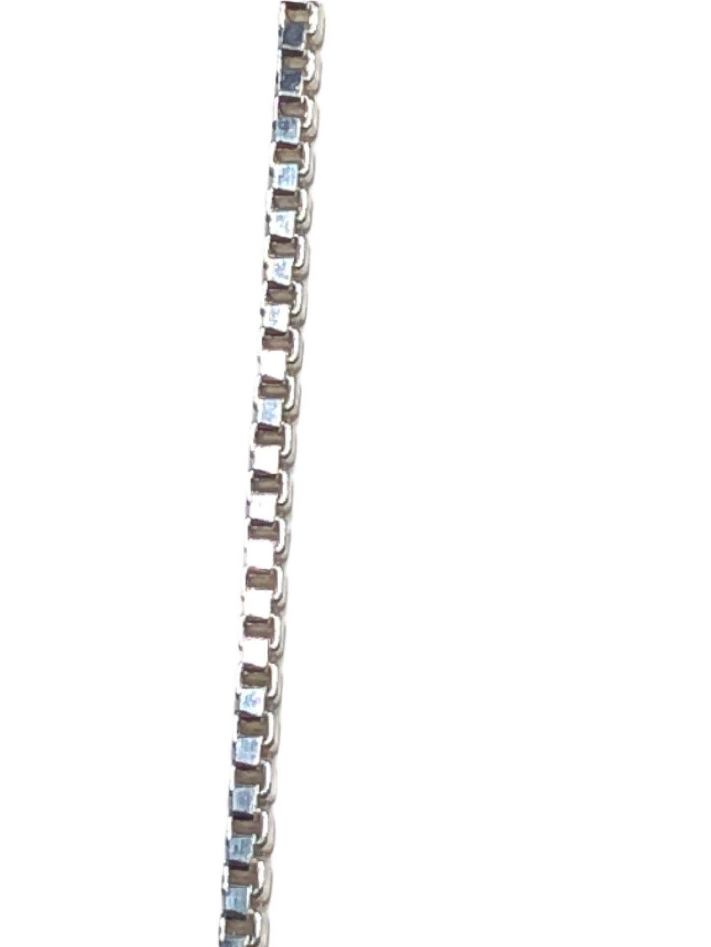 This sterling silver necklace features a box-chain style. Its dainty yet sturdy design makes this piece a great accessory for a variety of outfits.