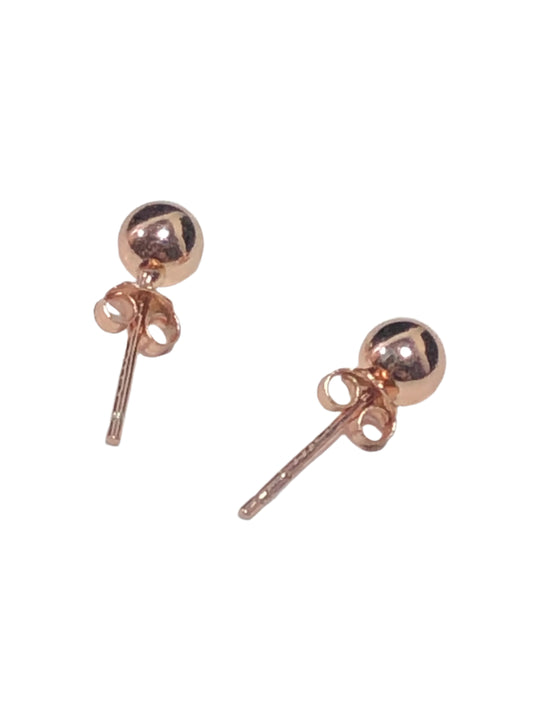 This lovely pair of stud earrings features luxurious rose gold overlaid on sterling silver. The dainty size is perfect for accessorizing any outfit with a touch of sophistication and style.