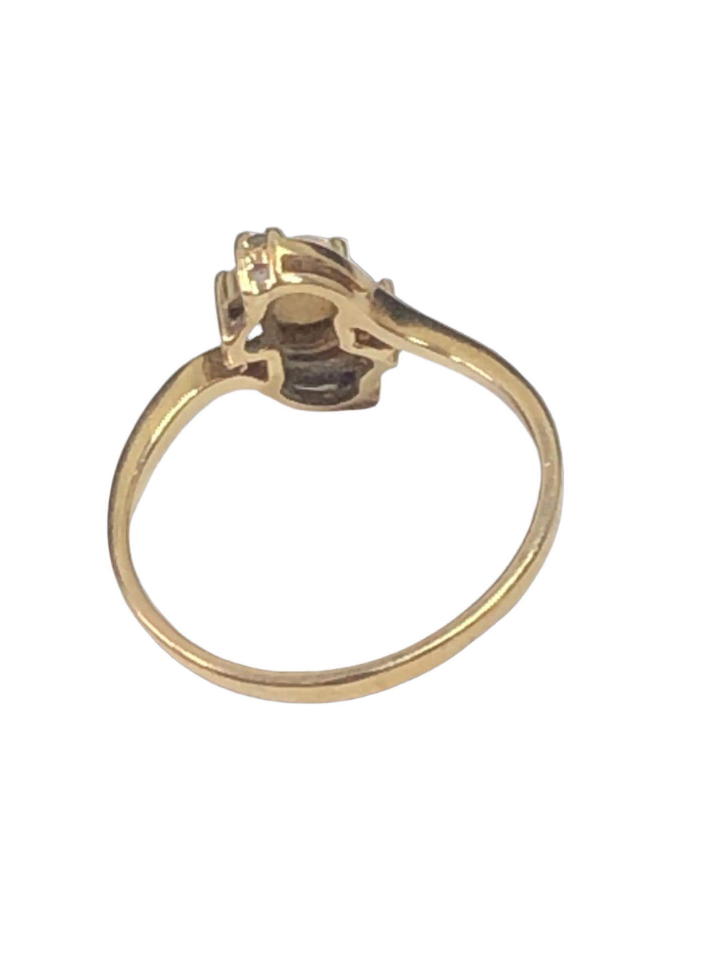 Experience luxury and elegance with our 10k gold ring. It features a shimmering opal that is complemented by small diamond accents.